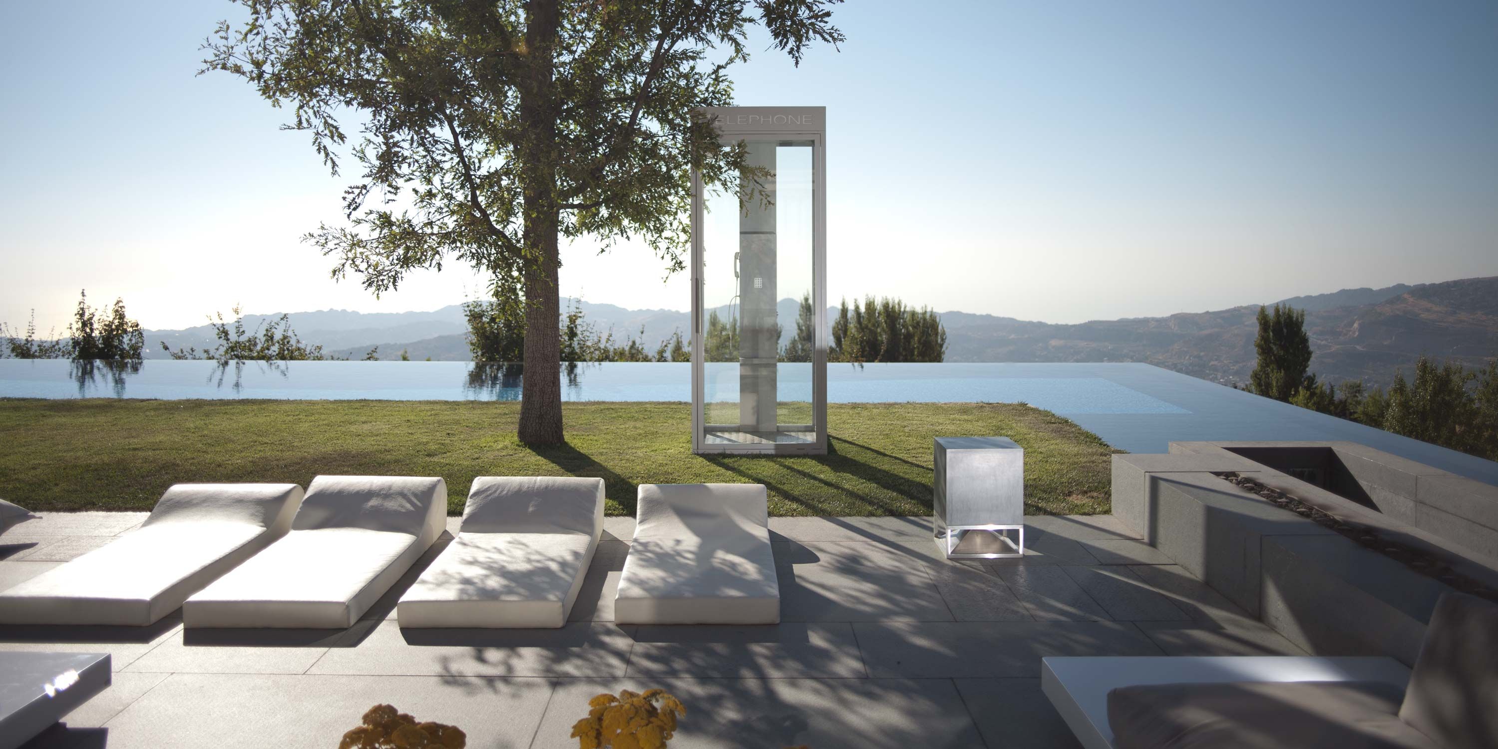 infinity pool with mountain view and archittetura sonora speakers